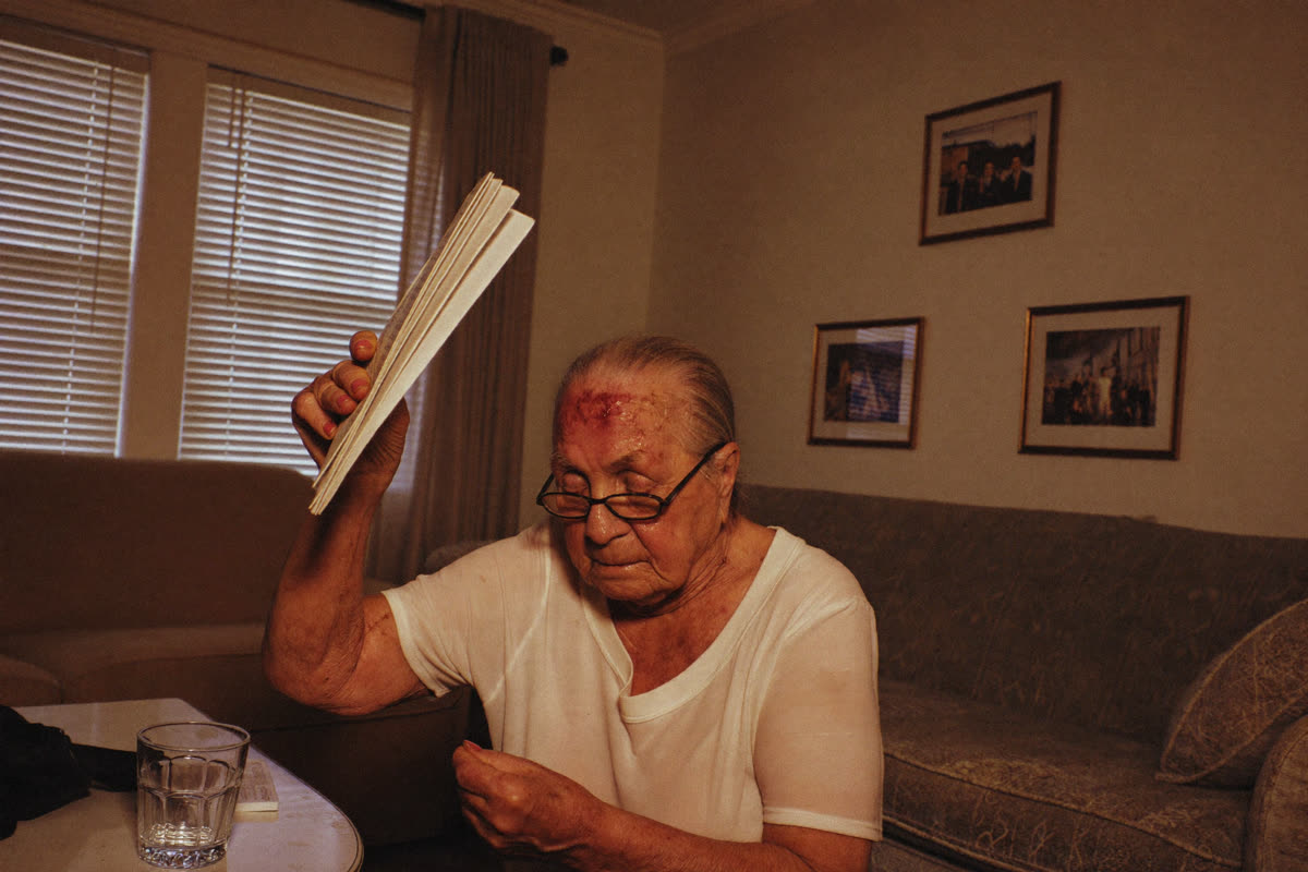 Daniel's 78-year-old mother fanning herself in her sweltering Phoenix home after her central air failed.